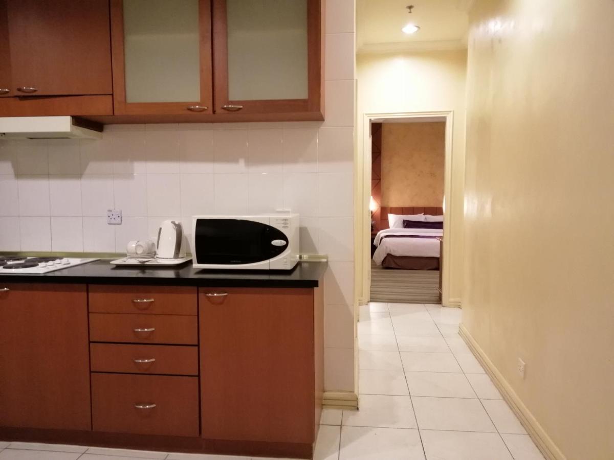 Stayinn Gateway Hotel Apartment Kuching Extérieur photo